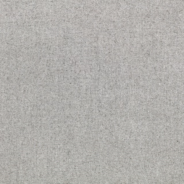 Close-up of cool slate-grey woven fabric with fine dark flecks