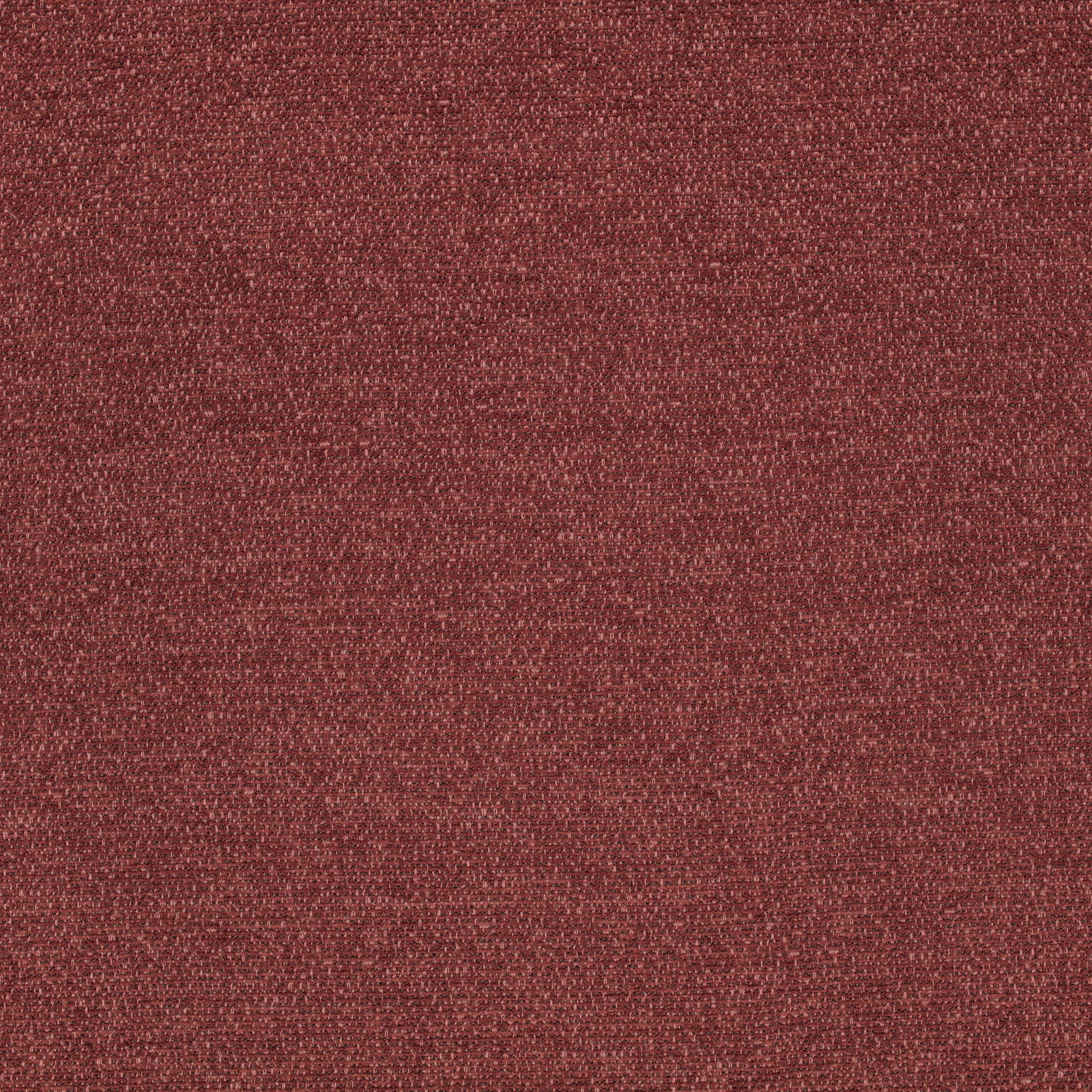 Close-up of muted brick-red woven fabric with fine flecked texture