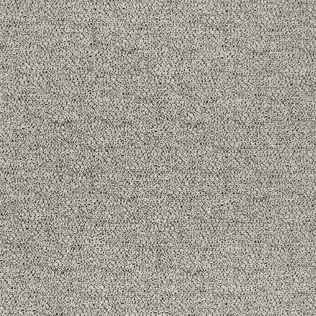 Close-up of charcoal grey woven fabric with dense black and pale flecking