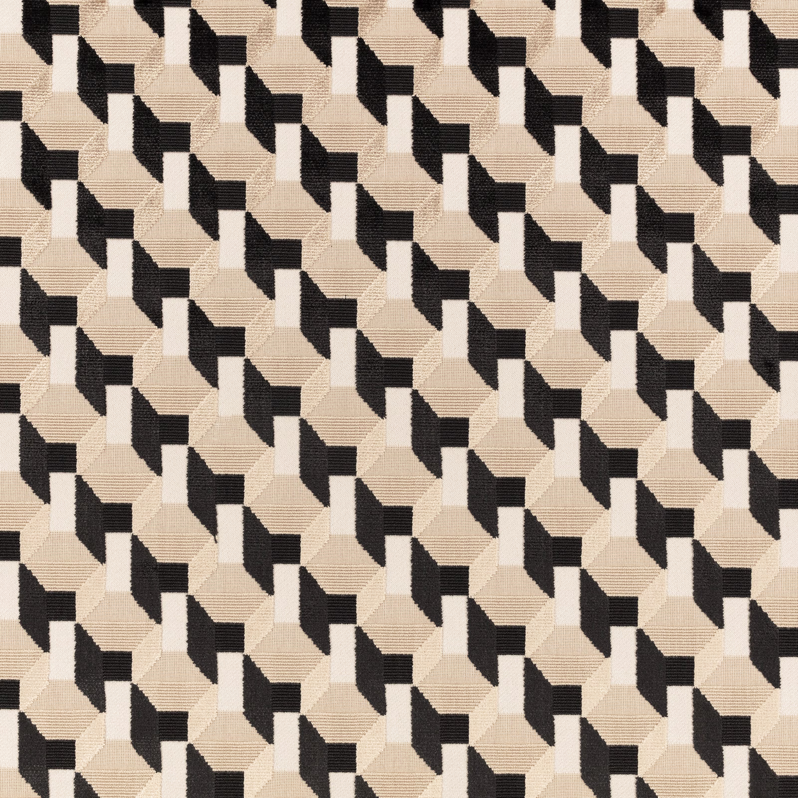 Warm ivory woven fabric with repeating black angular cube motifs