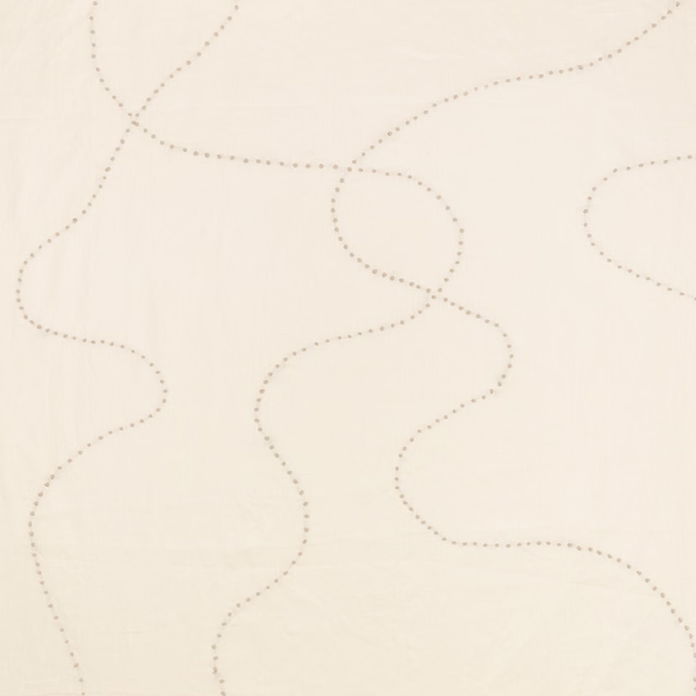 Chalk cream textile with fine taupe dotted loops and a subtly textured surface