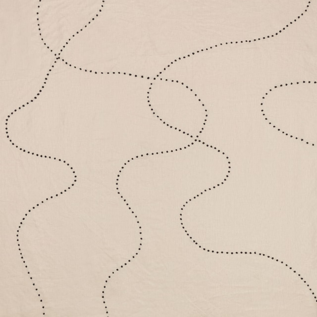 Warm ivory textile with winding charcoal dotted lines and subtle woven texture