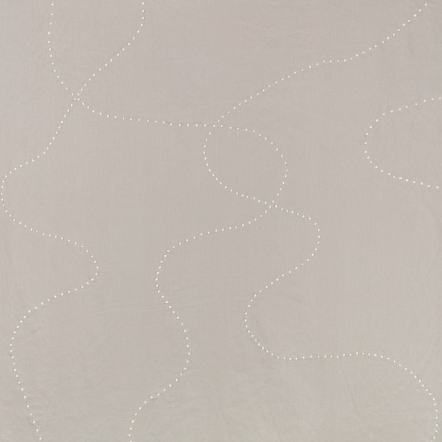 Pale silver-grey fabric with large looping dotted lines over a fine woven ground