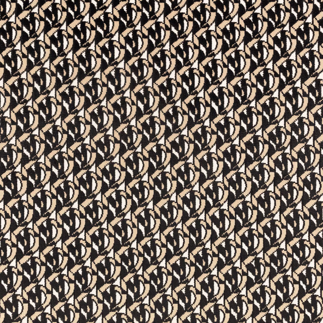 Close-up of black, cream and tan woven interlocking leaf-like motifs
