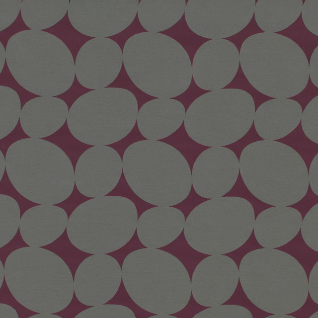 Deep berry textile with large muted grey circles and a fine woven texture