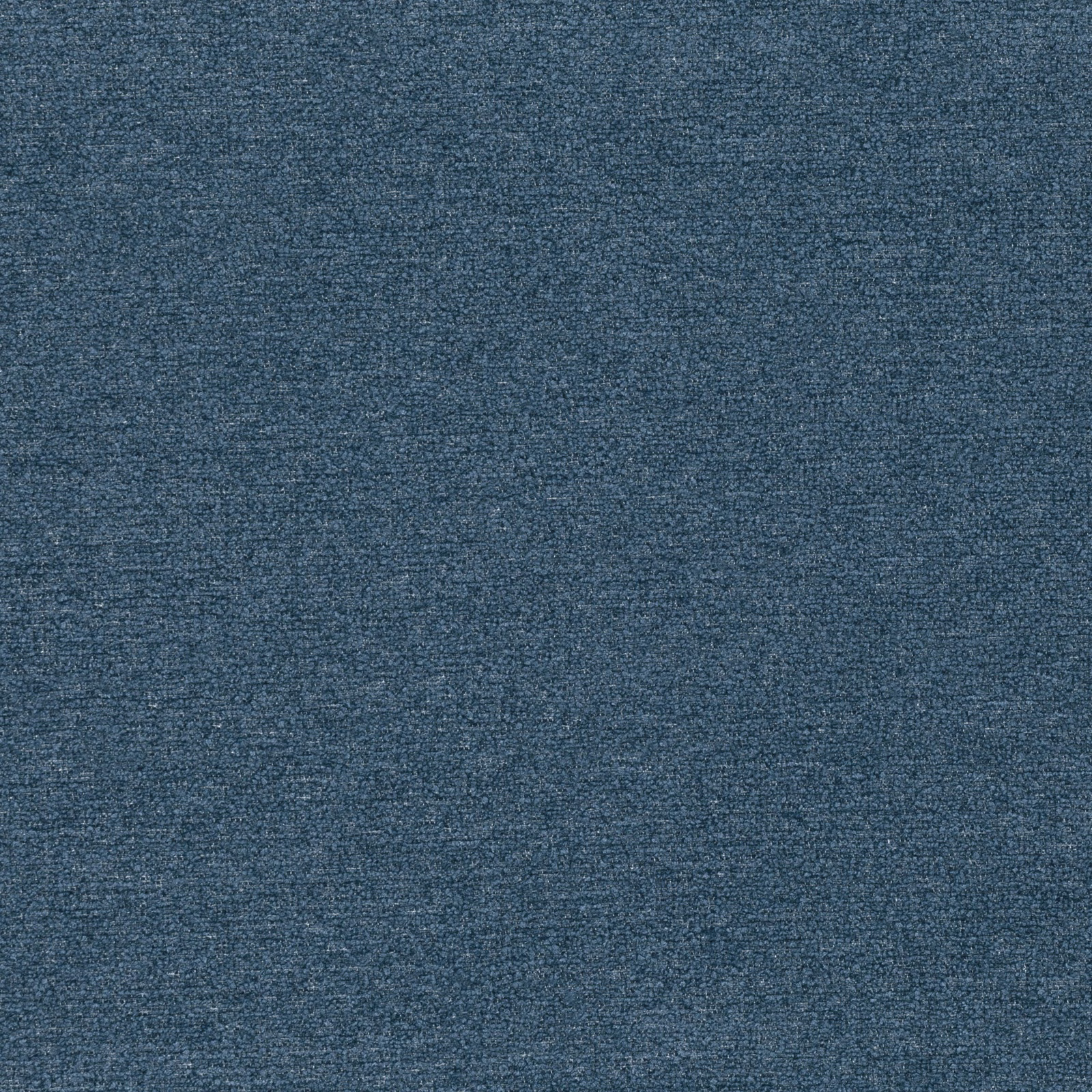 Close-up of deep blue fabric with a finely mottled woven texture