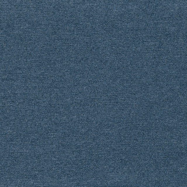 Close-up of deep blue fabric with a finely mottled woven texture