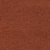 Close view of rust-orange woven textile with fine dark flecks and tonal texture