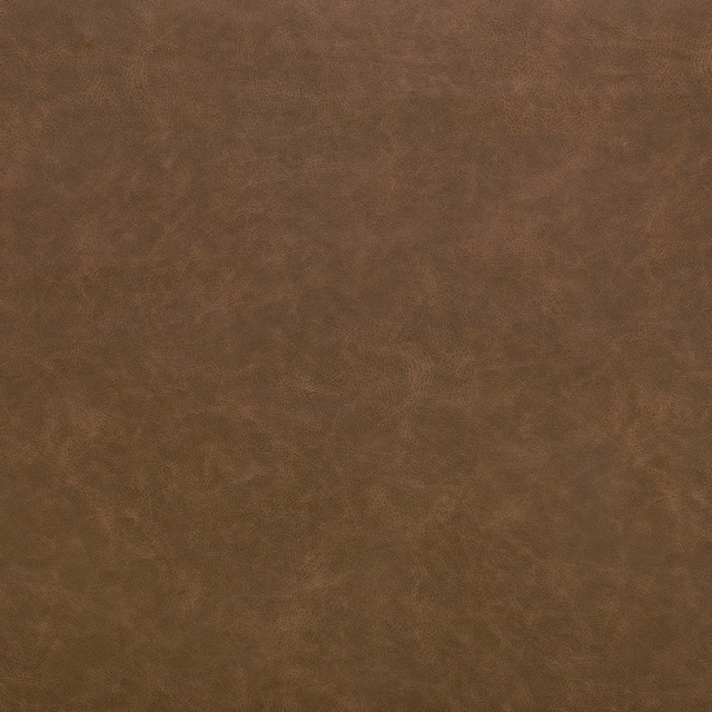 Close-up of warm hazelnut brown fabric with cloudy mottled grain texture