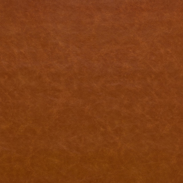 Warm caramel-tan fabric with cloudy mottling and a softly brushed-looking surface