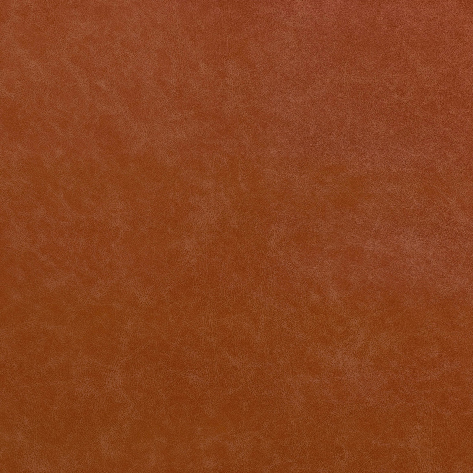 Warm terracotta fabric with subtle cloudy grain and softly mottled surface
