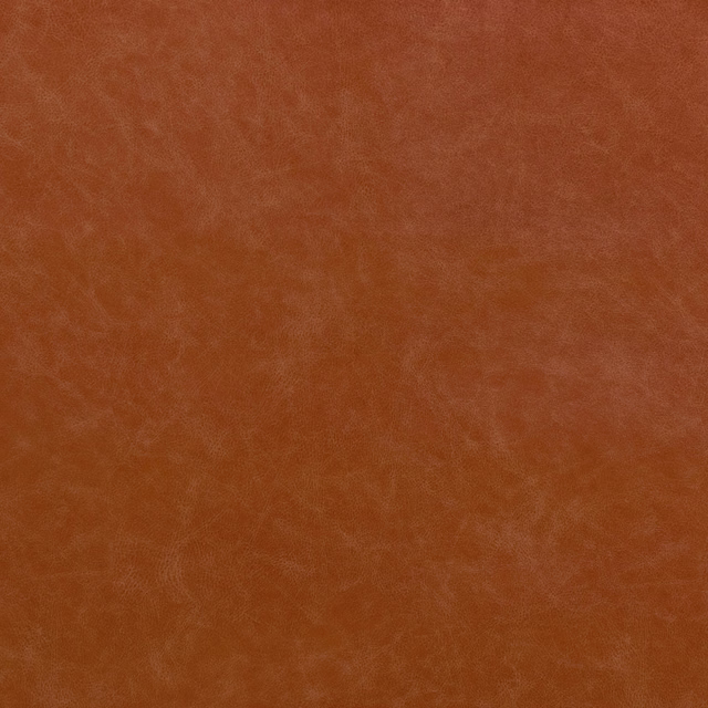 Warm terracotta fabric with subtle cloudy grain and softly mottled surface