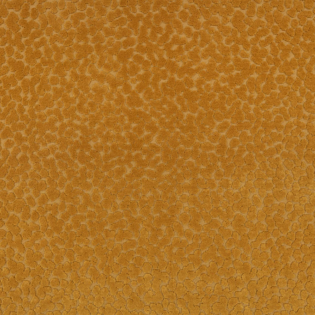 Close-up of warm tobacco fabric with a small irregular honeycomb-like textured motif