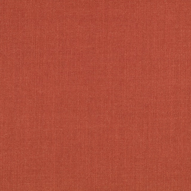Warm cayenne terracotta fabric with a subtle fine crosshatched woven texture