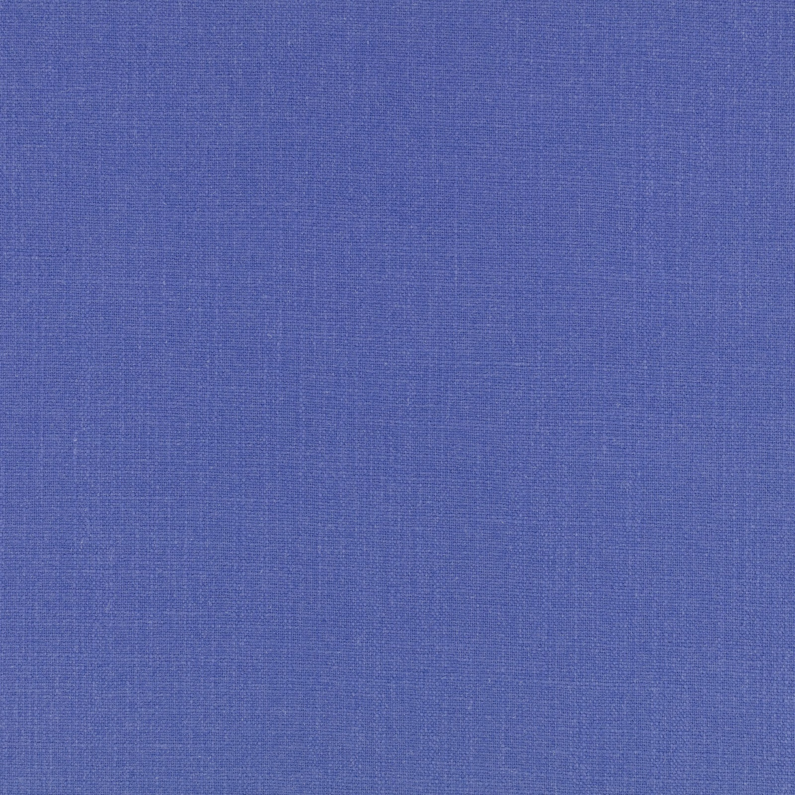 Close-up of saturated cobalt-blue woven fabric with subtle crosshatched texture