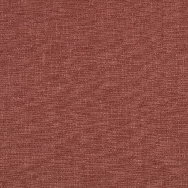 Dusty conker terracotta fabric with a fine, softly gridded plain weave
