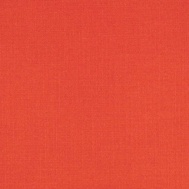 Vivid coral-red Hackney fabric with a fine, subtly crosshatched woven texture