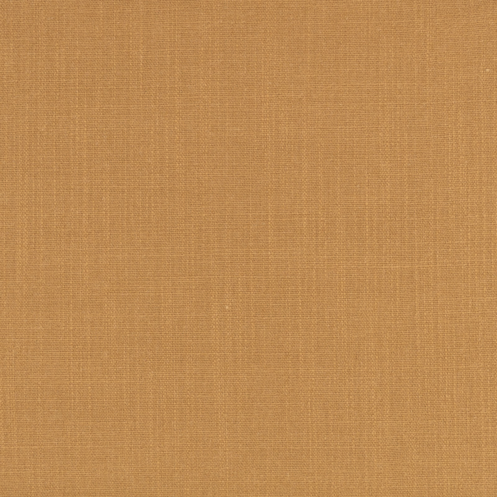 Close-up of warm golden ochre fabric with a fine, even woven texture