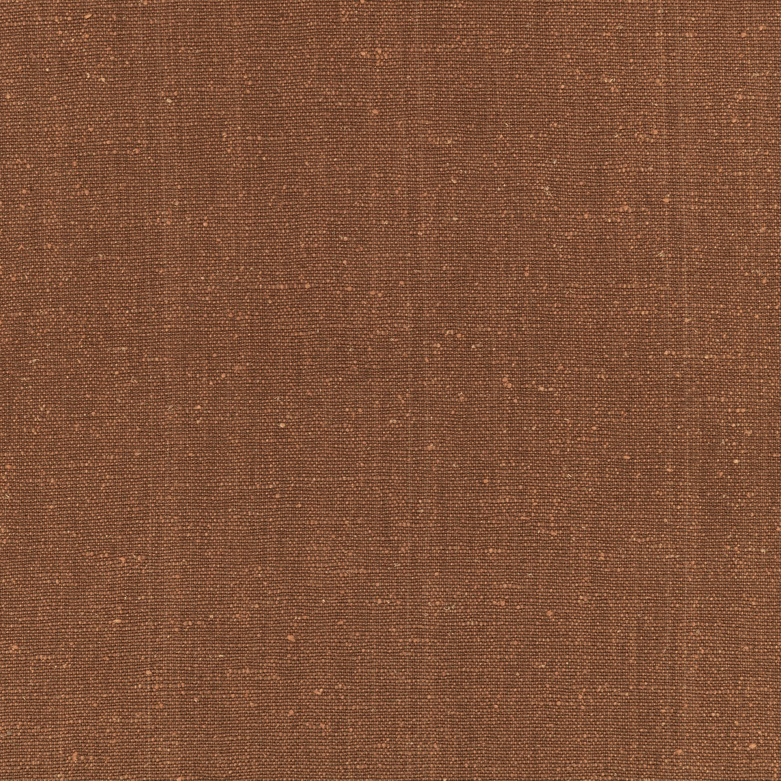 Close-up of warm clove-brown plain weave with fine, softly varied texture