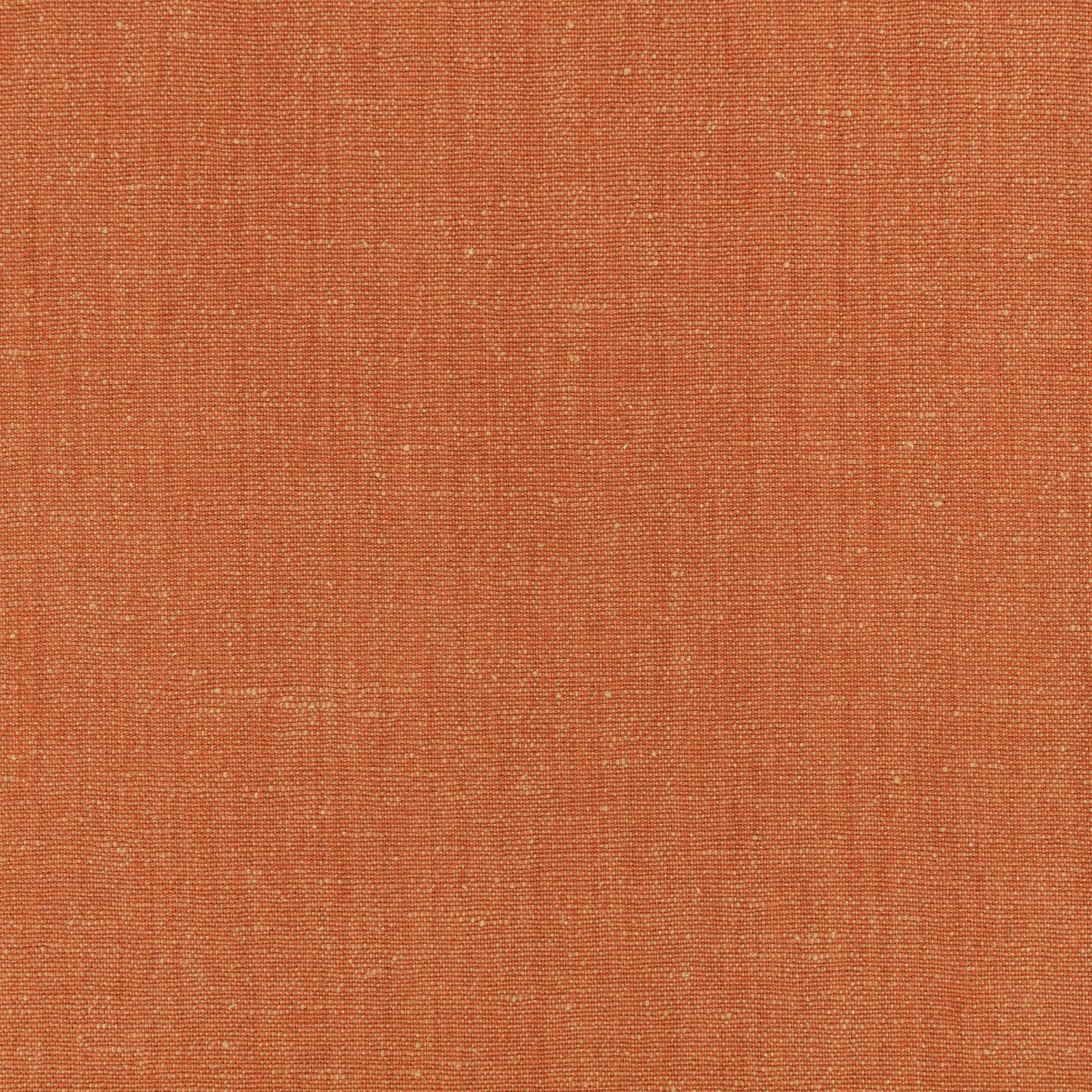 Warm rust terracotta fabric with a fine, subtly irregular woven texture