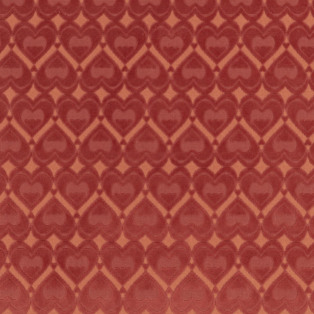 Ruby-red woven fabric with rows of tonal hearts and warm terracotta outlines