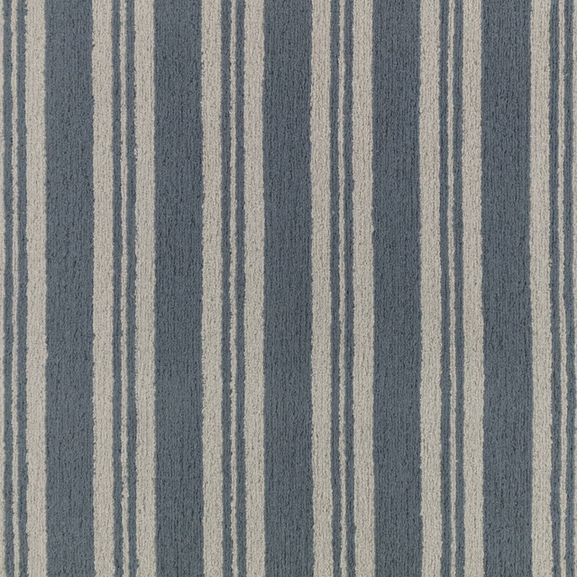 Muted denim-blue fabric with irregular pale vertical stripes and a softly nubby woven texture