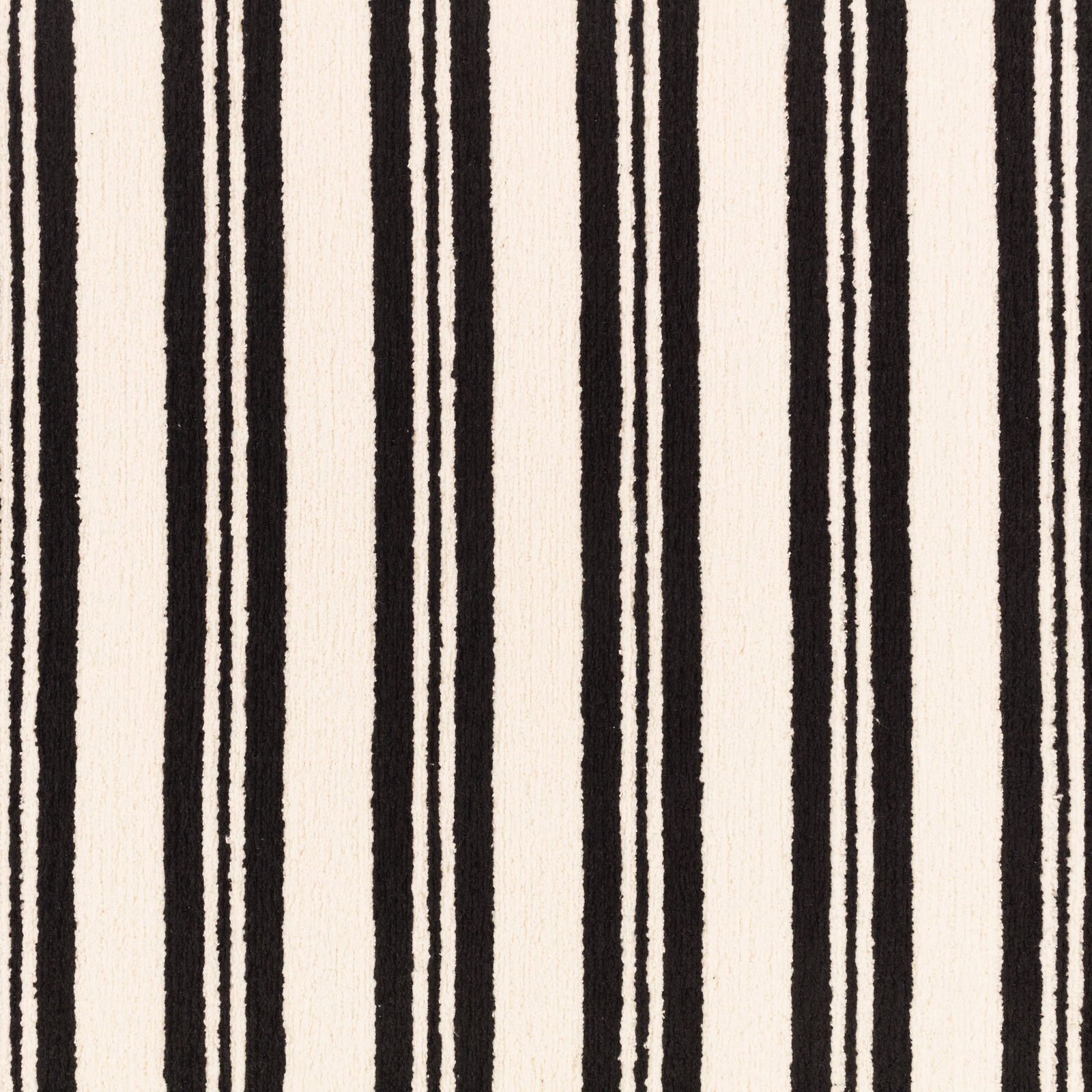Black and ivory woven fabric with uneven vertical stripes and tactile texture