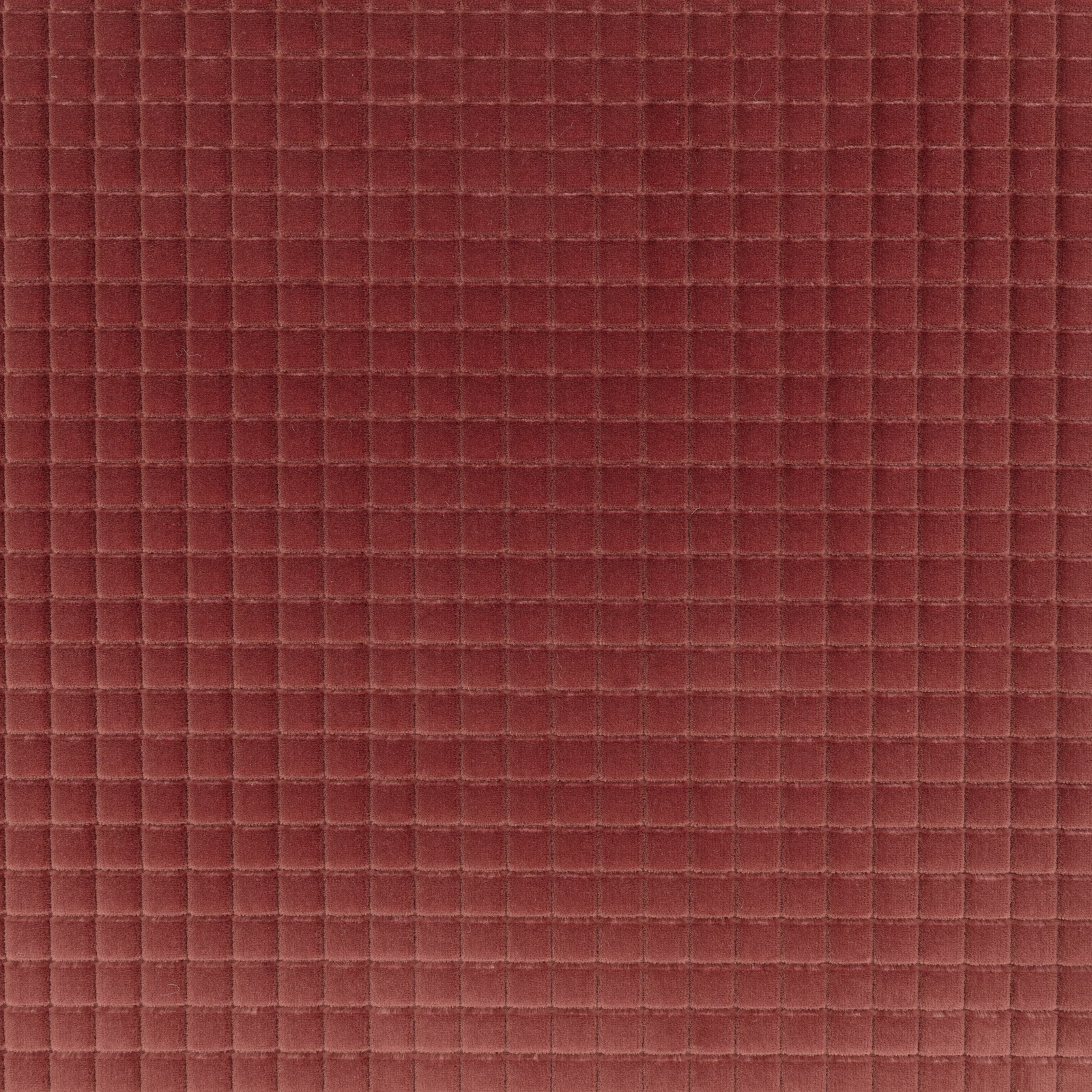 Close-up of Merlon Bloom in warm burgundy red with a small raised grid weave