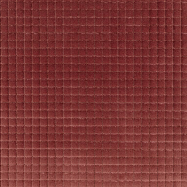 Close-up of Merlon Bloom in warm burgundy red with a small raised grid weave