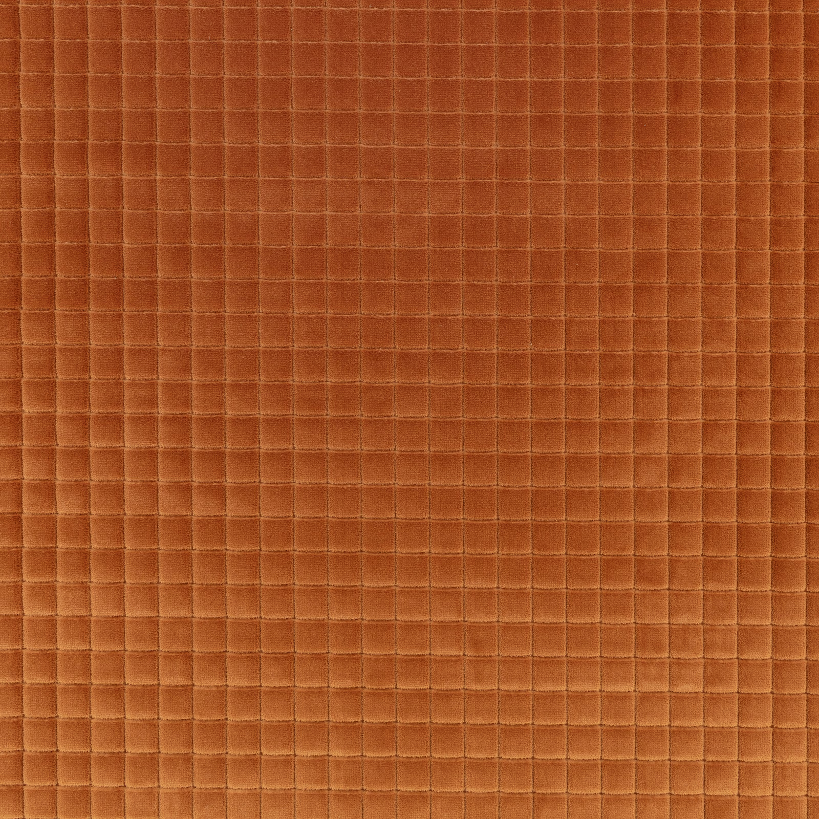 Burnt tangerine fabric with a fine raised square grid and softly plush surface