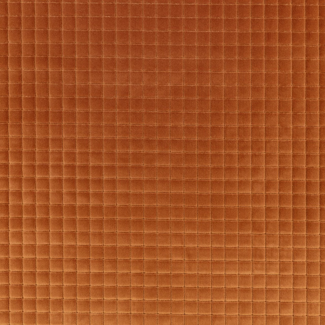Burnt tangerine fabric with a fine raised square grid and softly plush surface