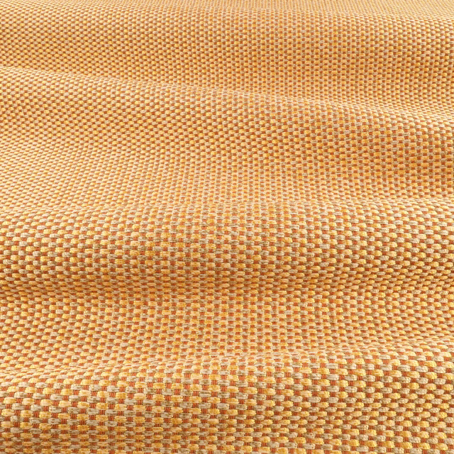 Warm marmalade-orange woven swatch with cream flecks and a raised grid texture