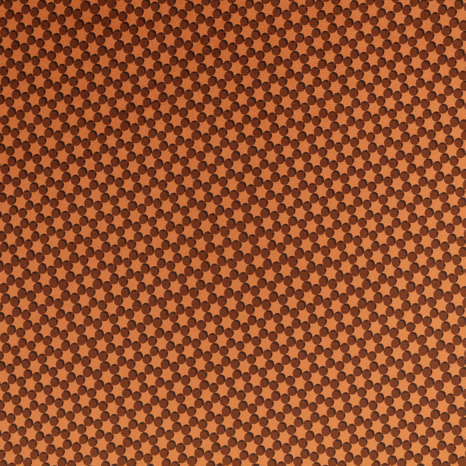 Warm clove-brown textile with dense dark chocolate circular dot weave