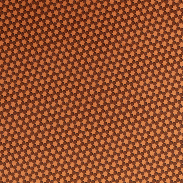 Warm clove-brown textile with dense dark chocolate circular dot weave