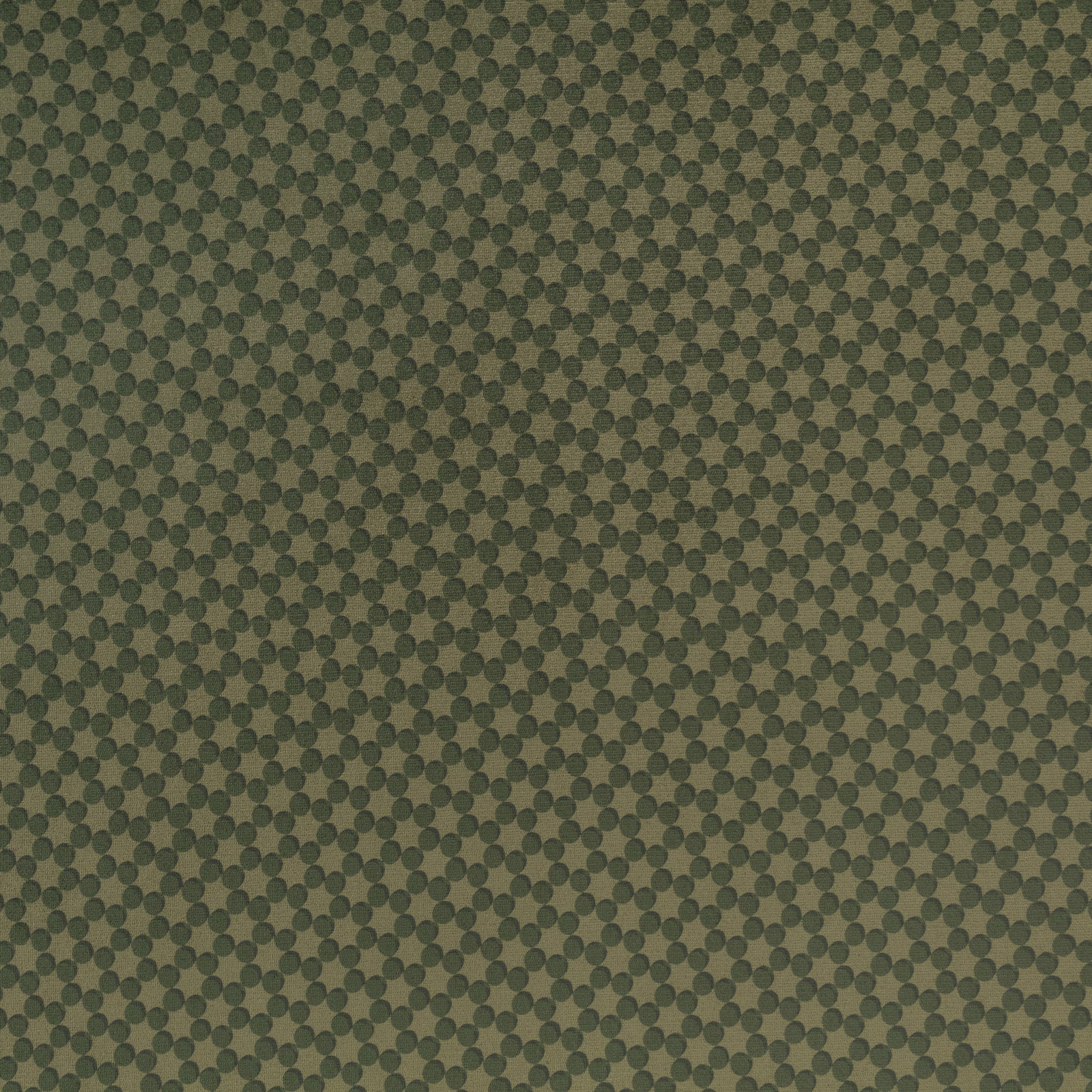 Muted pine-green textile with dense repeating circular motifs and softly mottled weave