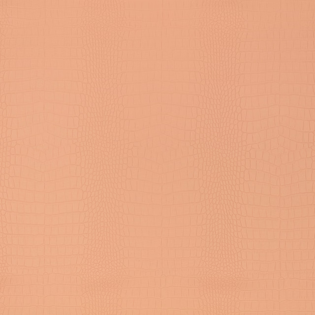 Warm peach-clay textile with tonal embossed crocodile pattern and softly varied reptile-scale texture