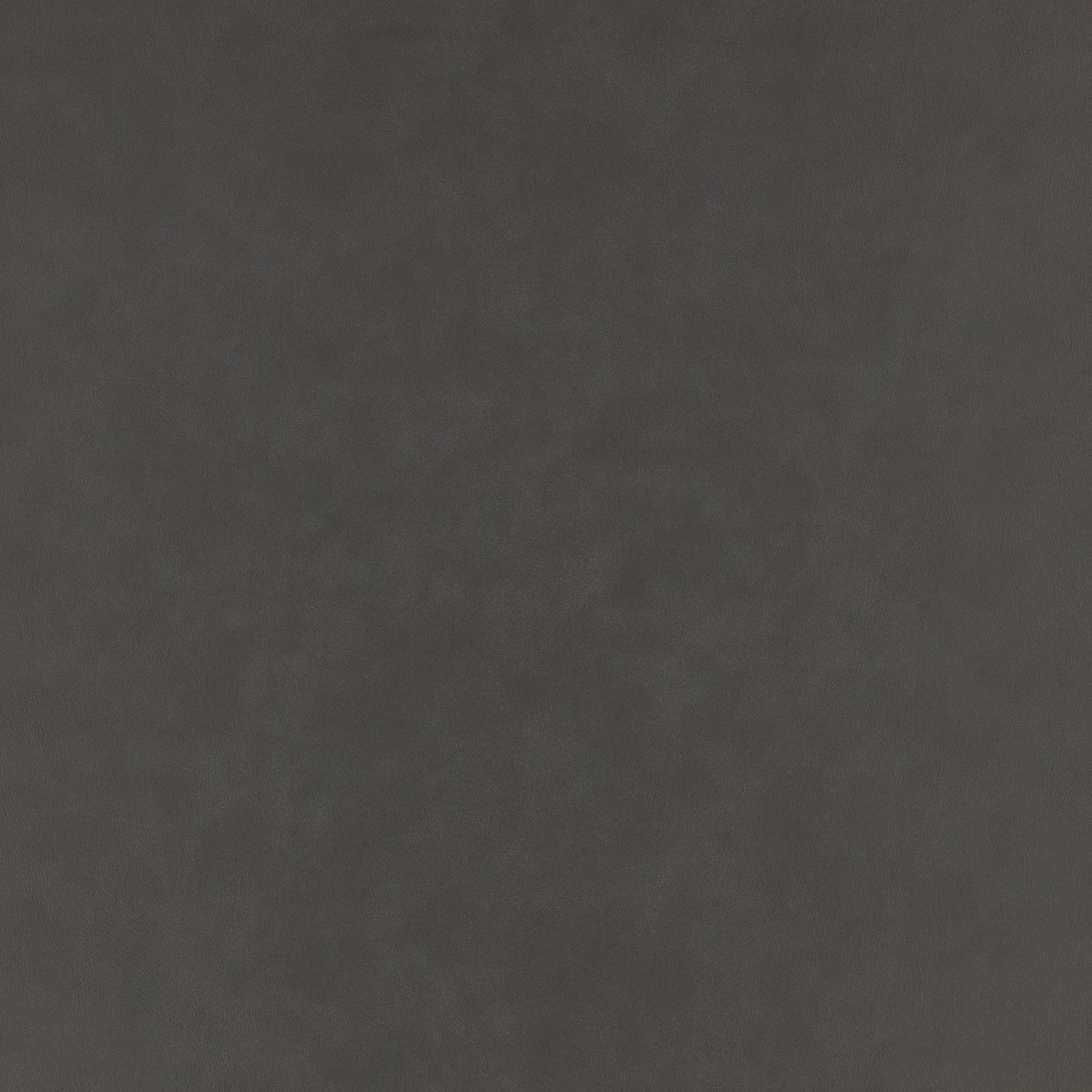 Subtly mottled jet-black vegan leather surface with a soft charcoal cast