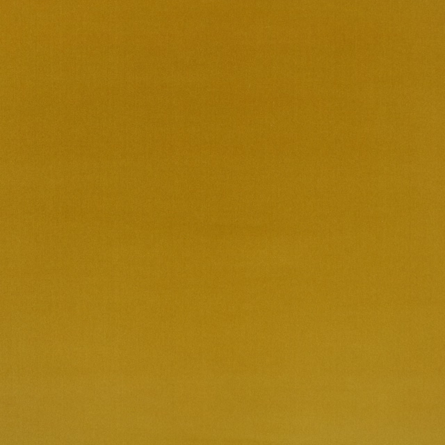 Close-up of plain ochre chartreuse textile with a softly brushed, fine surface