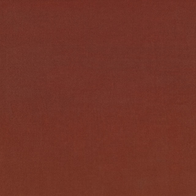 Close-up of warm russet-brown Ice Conker fabric with a subtle matte woven texture