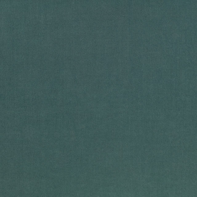 Muted deep teal fabric with subtle cloudy variation and a fine woven surface