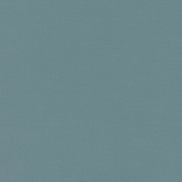 Close-up of muted blue-teal Ice Mineral fabric with a fine, even woven texture