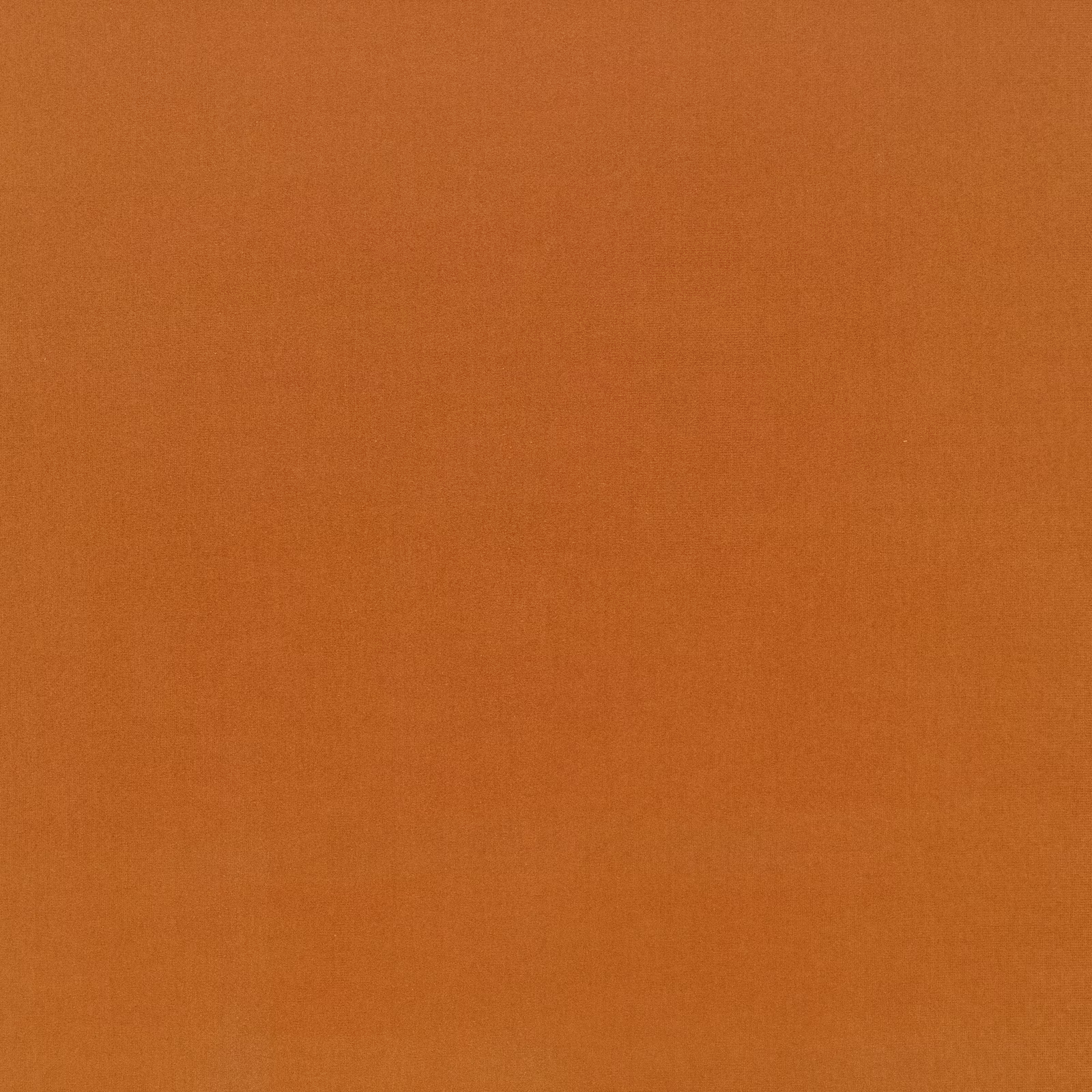 Close-up of warm tangerine-orange fabric with a fine, subtly textured plain weave