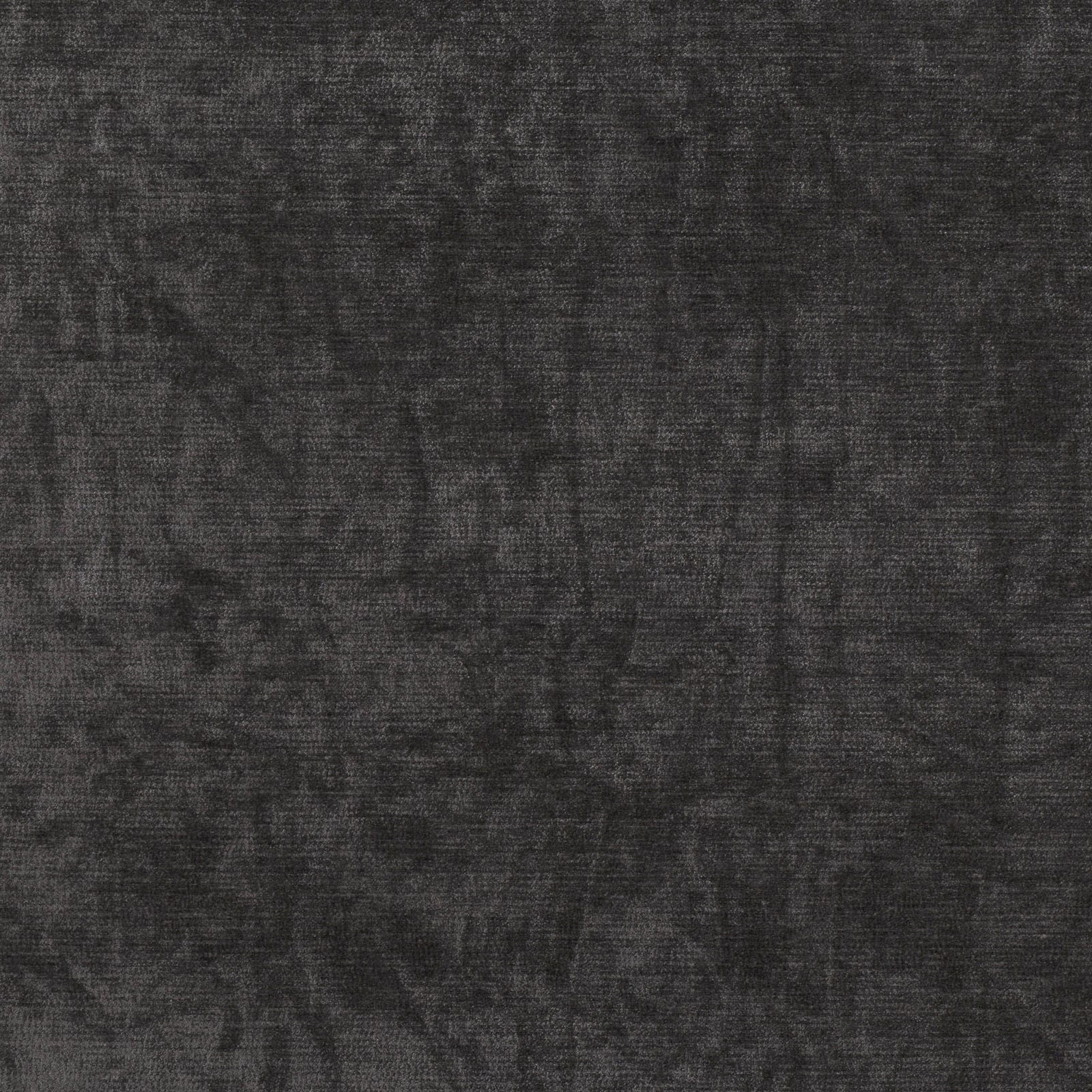 Close-up of deep charcoal woven fabric with smoky mottled blocks and fine horizontal texture