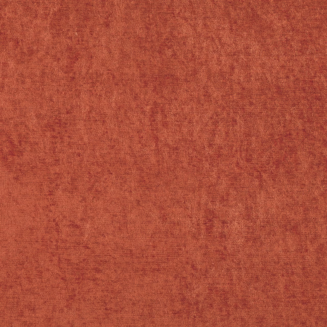 Close-up of Ion Rust showing a warm rust terracotta fabric with mottled woven texture
