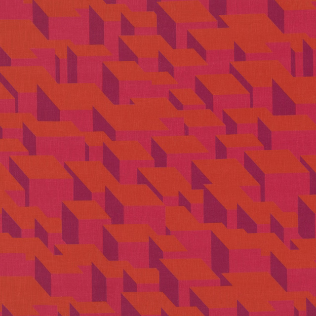 Lava red woven fabric with orange geometric blocks and deep plum shadows