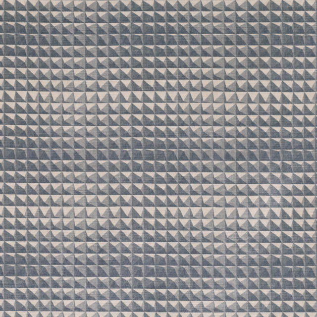 Cool concrete-grey woven fabric with dense charcoal and pale pyramid triangles