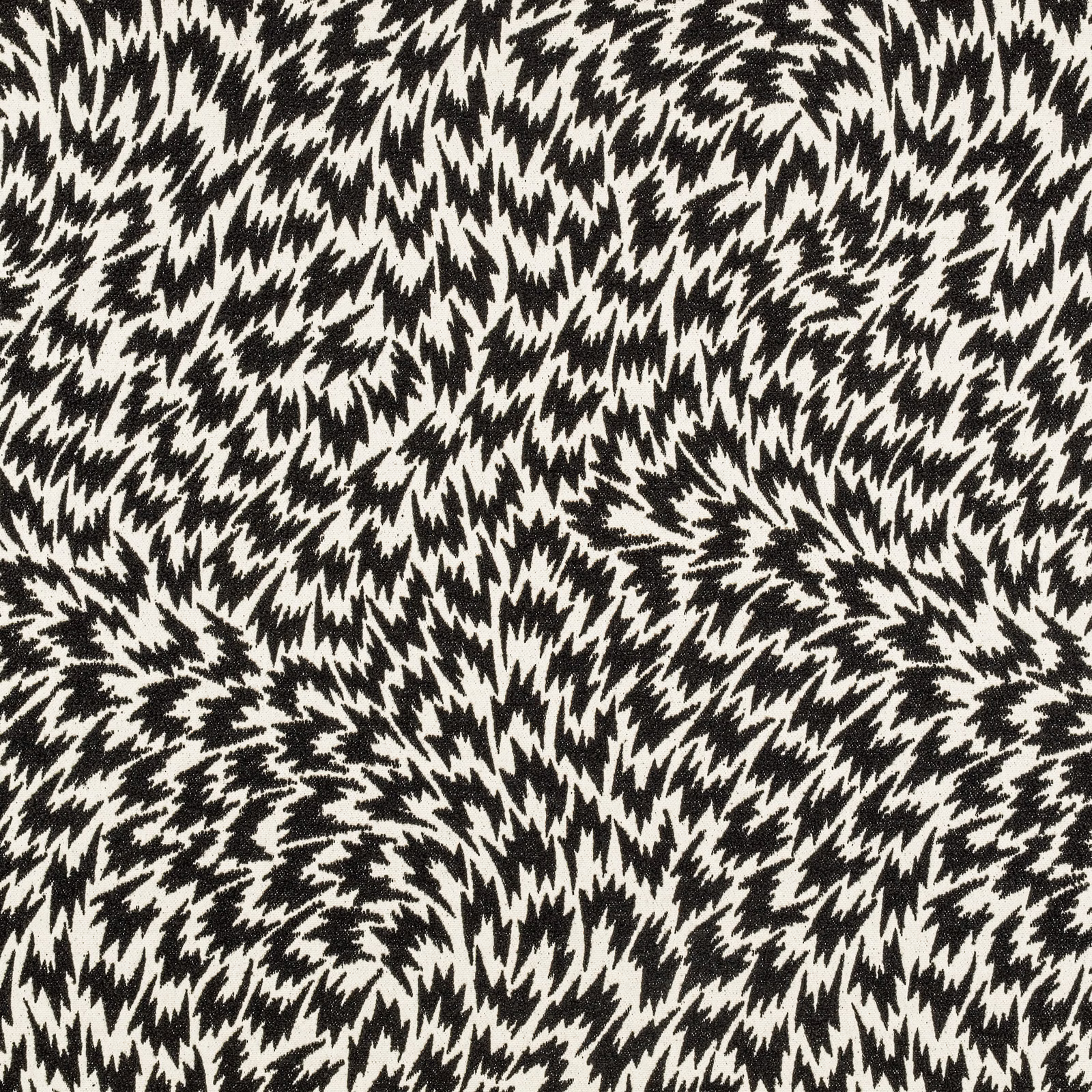 Dense black-and-cream jagged feather motif woven across a textured monochrome surface