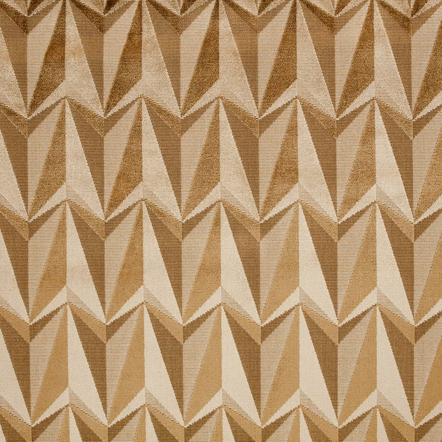 Warm tan and cream woven rockets form a repeating angular geometric pattern