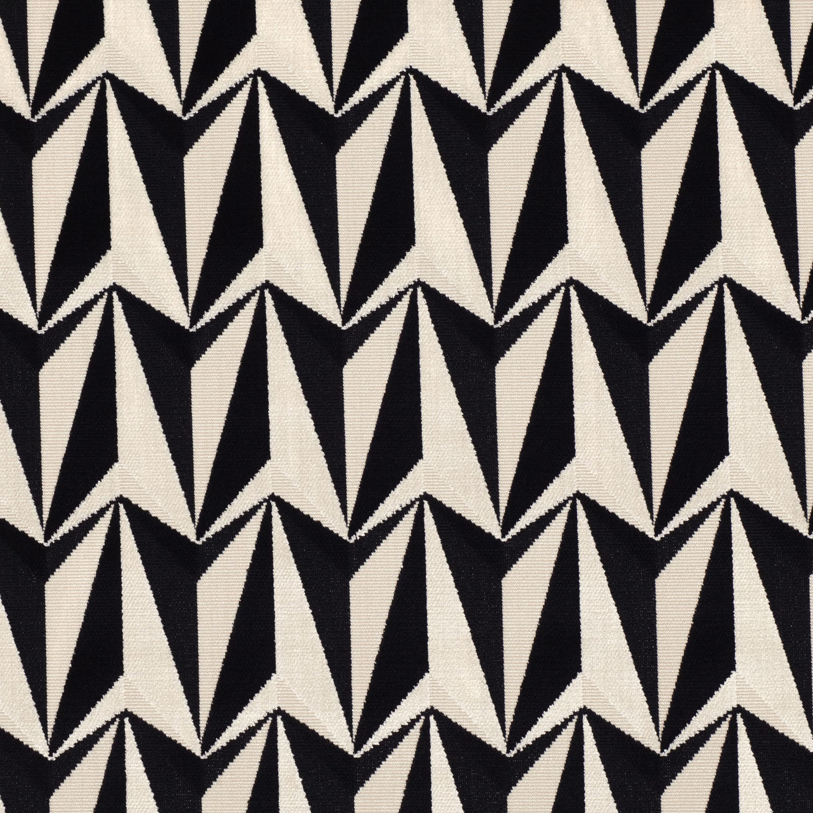 Black and ivory woven fabric with repeating angular rocket motifs