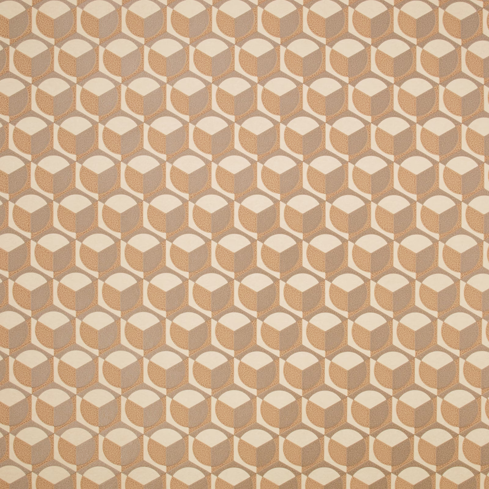 Warm rose-gold wallpaper with repeating cream and bronze faceted cube motifs